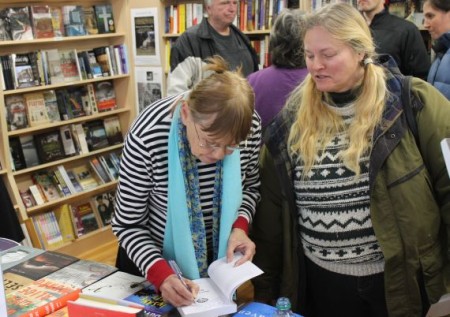 Carole Borges Signing a Book for Sonja Spell, Union Avenue Books, Knoxville, January 2013