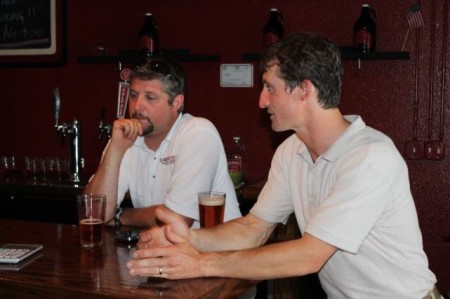 Adam Palmer (Saw Works) and Chris Burger (Century Harvest Farm) discuss farming at Saw Works Brewing Company, June 2012