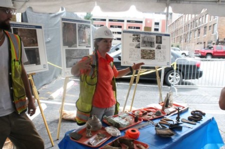 Jessica Stanton, Project Supervisor, explains artifacts at TVA site, Knoxville, July 2013