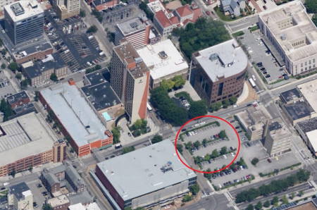 Aerial View of the building and parking lot, Circle indicates the former location of the Hotel Arnold