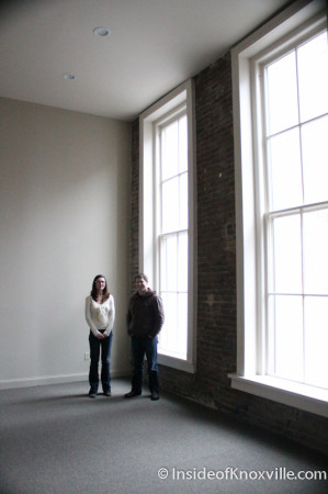 Jenny Brown and Patrick King beside the massive rear windows, Century Building, 312 S. Gay Street, Knoxville, February 2014
