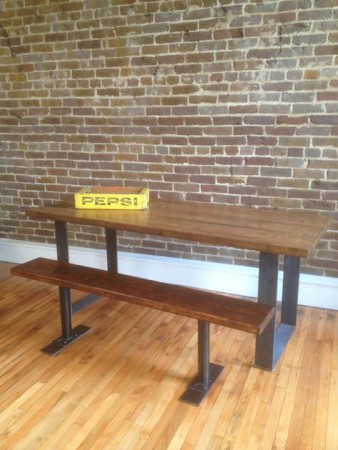 Industrial-style tables constructed by Charlie Havener from re-puposed materials